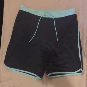 Light blue swimming trunks.